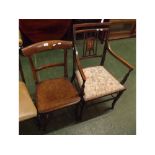 Edwardian mahogany carver chair with inlaid splat, and a further bow back hard-seated Victorian