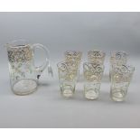 Early 20th century glass lemonade set, comprising a jug and six glasses, decorated with floral and