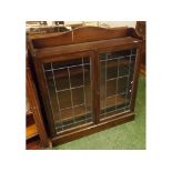 Early 20th century oak and leaded glass bookcase, 42" wide