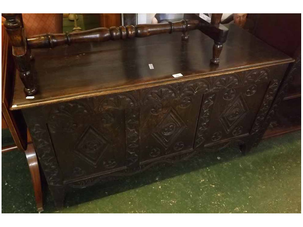 19th century oak coffer, the three panelled front decorated with carved detail, 46" wide