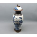 Chinese crackle glaze covered vase, of baluster form, typically decorated in blue, 12 1/2" high