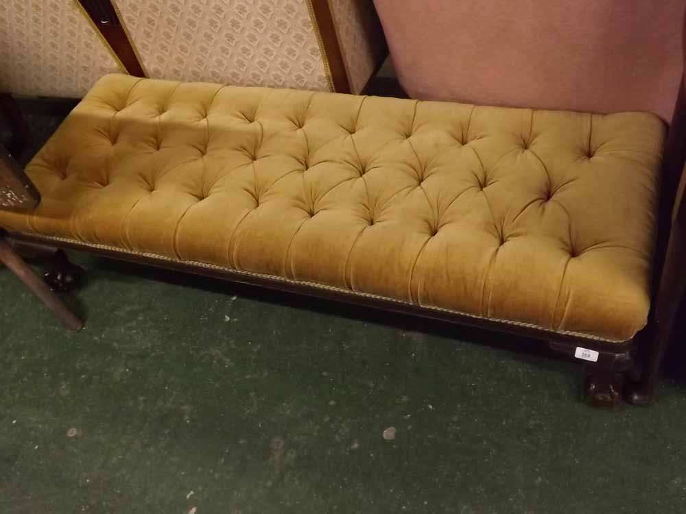 Victorian mahogany stained long stool, with button back seat and claw and ball feet, 55" long