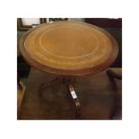 Reproduction mahogany occasional table, with gilt tooled leather inset, 16" diameter