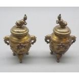 Pair of oriental brass or antimony overlaid lidded pots