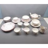 Collection of various Victorian pink lustre wares, comprises tea pot, various cups and saucers, slop