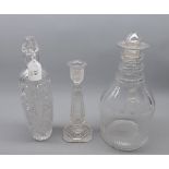 Large glass decanter with non-matching stopper; further glass candlestick and a further modern glass