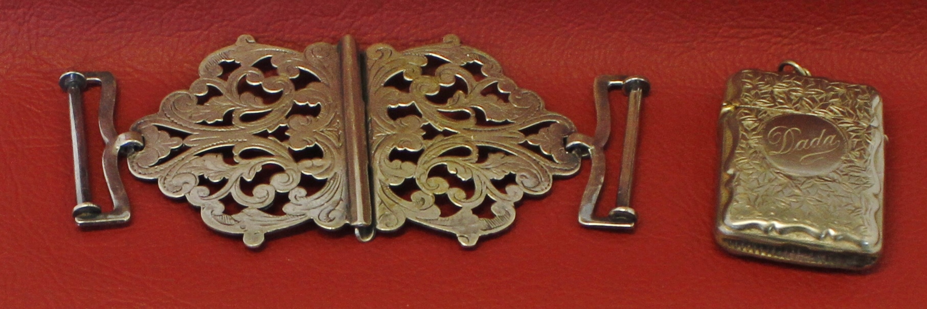 Mixed Lot: electroplated two-part nurse's buckle of typical form with pierced foliate detail,