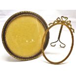 Mixed Lot: gilt morocco easel back photograph frame of circular form by Walter Jones, Sloane Street,
