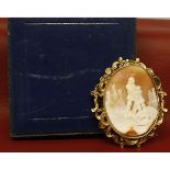 Large Victorian oval cameo brooch, depicting two classical figures in a castle landscape, ornate