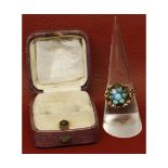 9ct gold and turquoise set dress ring, an open flower-head design set with seven turquoise