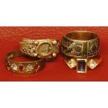 Mixed Lot: four various rings comprising two paste-set rings, a filigree and metal mourning ring,