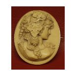 Victorian oval lava cameo brooch, head and shoulders of a classical young lady in yellow metal