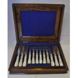 Late 19th century electroplated and mother-of-pearl set of twelve each dessert knives and forks,