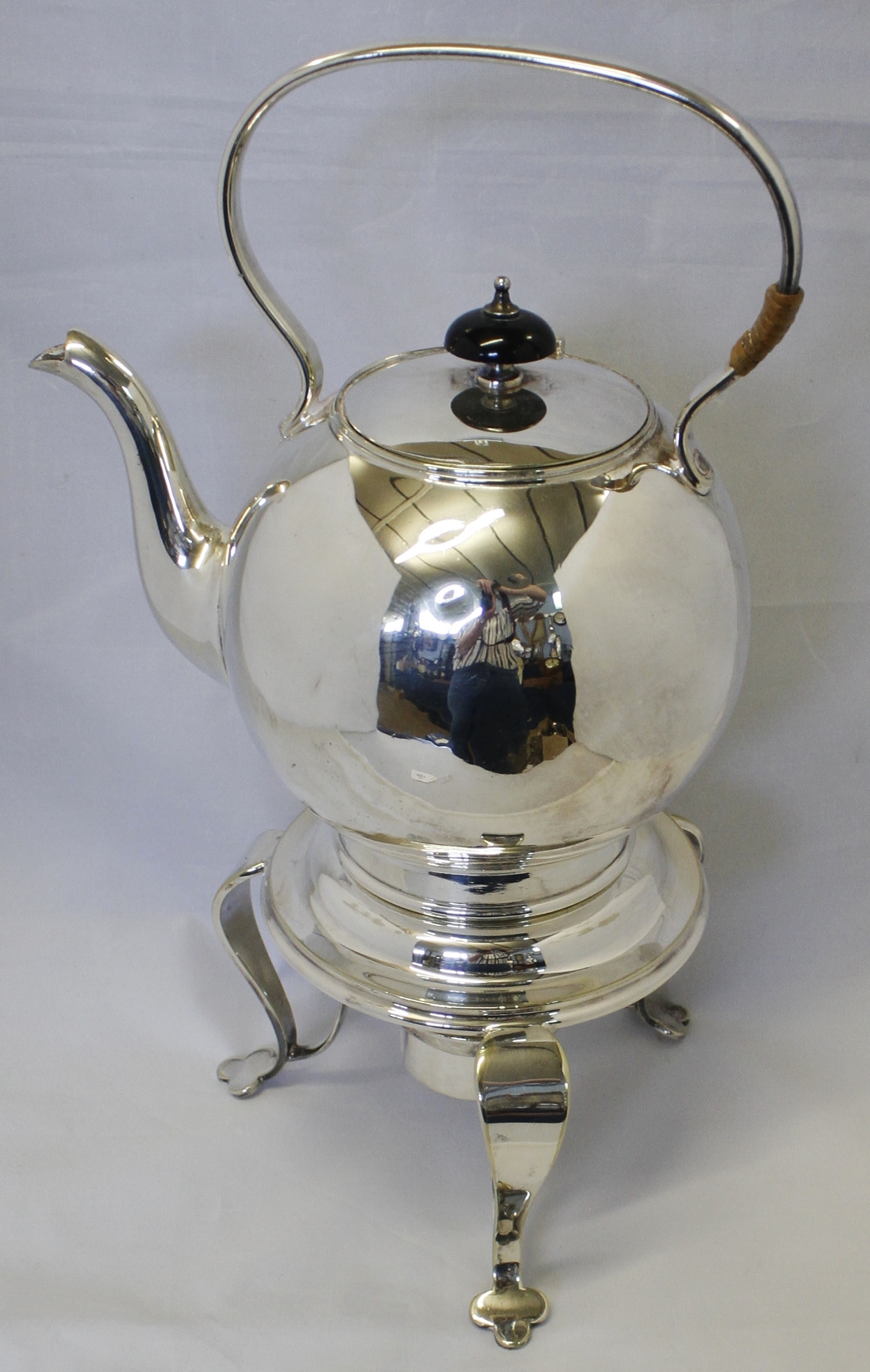 Early 20th century electroplated tea kettle on stand, the kettle of spherical form with overhead