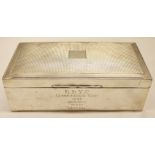 George V table cigarette box, of rectangular form, the hinged cover with engine-turned decoration