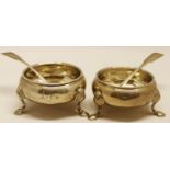 Two various late 18th century cauldron salts, each of typical polished form and raised on cast and