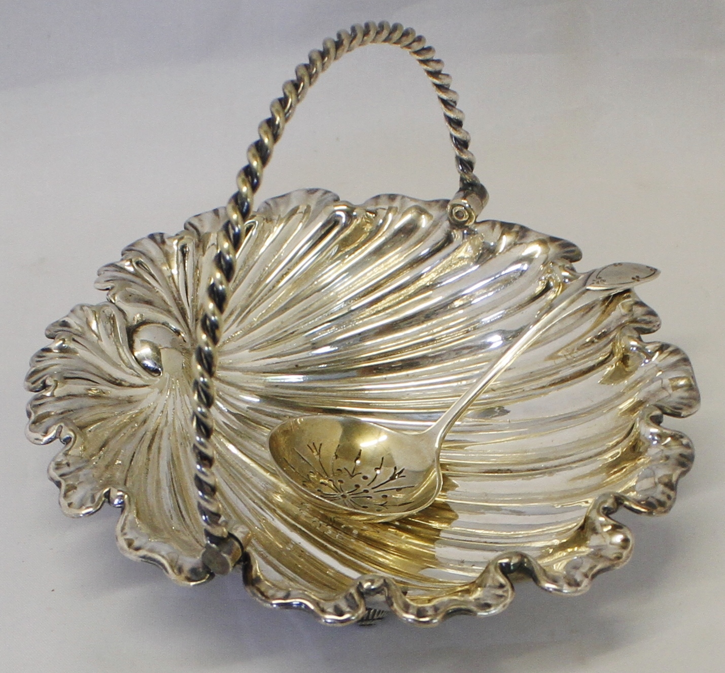 Mixed Lot: mid-20th century electroplated swing-handled table basket of shaped circular form and