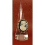 Antique cameo ring, the oval hardstone cameo depicting a Bacchanalian lady (chipped), finger size P