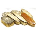 Mixed Lot: two various dressing table hand mirrors, four various silver backed clothes brushes and