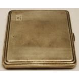 George VI cigarette case, of hinged square form with canted corners and all over engine-turned