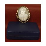 Late 19th century shell cameo brooch, the oval cameo carved to depict a classical figure, mounted in