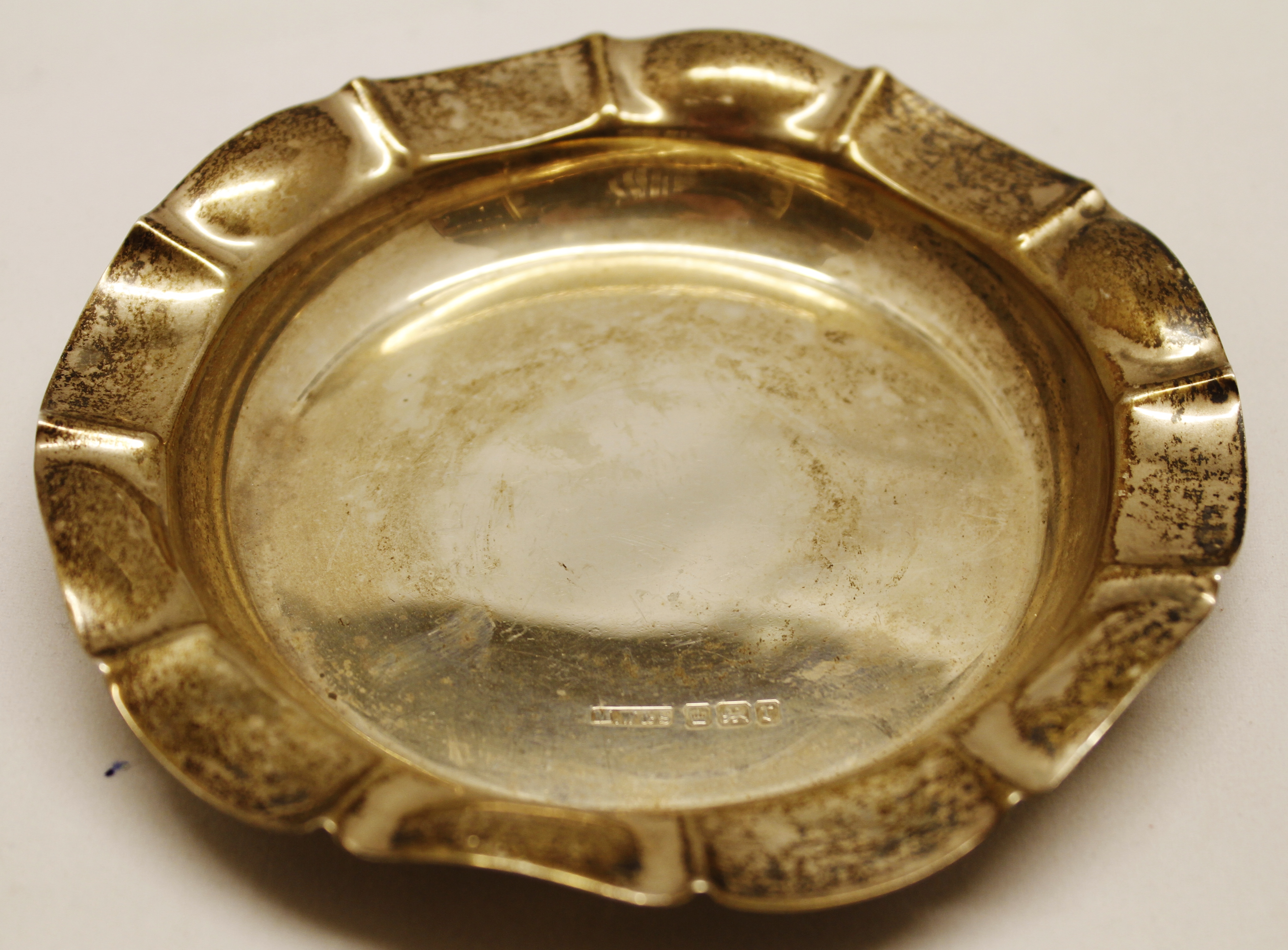 Edward VII circular dish, with shaped rim and polished centre, diameter 4 1/2", Sheffield 1909,