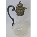 Formerly electroplated base metal mounted and clear cut glass claret jug, the embossed collar with