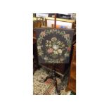 19th century mahogany pole screen with floral tapestry panel