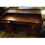 Warings of London early 20th century mahogany tamber topped twin pedestal desk, with seven drawers