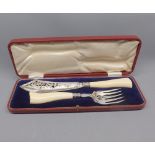 Red leather cased pair of silver plated fish servers