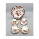 Quantity of Royal Crown Derby table wares, comprising four cups and saucers and a circular plate,