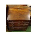 18th or early 19th century oak bureau of small proportions, the fitted interior with central well