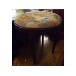 Late 19th or early 20th century tapestry topped circular stool raised on tapering legs