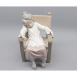 Lladro figure of a sleeping child in a chair