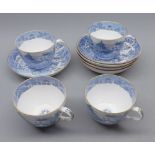 Quantity of 19th century English blue and white Willow pattern teacups and saucers, unsigned