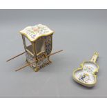 Mixed Lot: Quimper novelty salt dish formed as a guitar and a further Quimper model sedan chair,