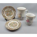 Pair 20th century Chinese plates, decorated with scenes of butterflies amongst foliage; plus two