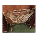 Unusual French Victorian brass framed swinging baby's cot, 43" wide