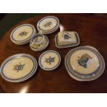 Wilkinsons Limited Clarice Cliff style part dinner service: two meat plates, covered vegetable dish,