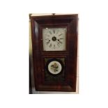 E N Welch, Forestville, Connecticut, mahogany cased wall clock