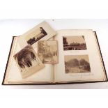 VICTORIAN ALBUM containing assorted late 19th century albumen print photograph views, images include