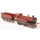 Hornby O gauge clockwork locomotive of nut and bolt construction, features brass number plate 2711