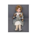 Armand Marseille 390 bisque socket head doll, with fixed brown glass eyes, painted lashes and brows,