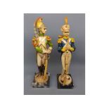 Pair of modern French soldier figures on marbled finish bases