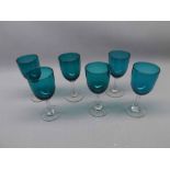 Set of six green bowled clear stemmed and based wine glasses