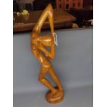 Carved wooden study of a female nude, 27 high