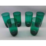 Six green glass tumblers