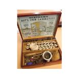 Pine framed table top boxed Stathams boy s own laboratory with assorted measures, jars, miniature