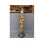 Large glass vase containing preserved flowers, 23 high