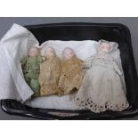 Tub containing four Victorian dolls house dolls in period clothing, measuring approx 3 tall